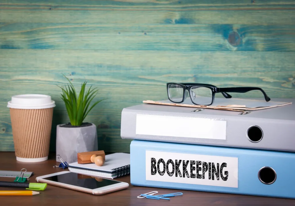 bookkeeping concept. Binders on desk in the office. Business background. bookkeeping concept. Binders on desk in the office. Business background.